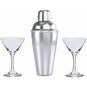 A drink bottle in silver with two clear martini glasses on either side. The bottle has a sleek design and a top.