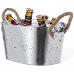 A silver bucket filled with ice and multiple bottles, featuring handles made of rope.