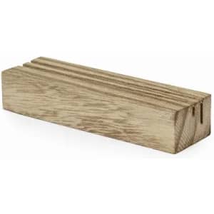 A wooden block, rectangular in shape, with a light brown finish and visible wood grain texture.