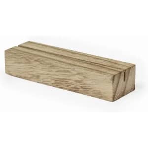 A wooden block with a light brown finish, featuring a simple rectangular shape and natural grain texture.