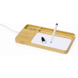 A bamboo desk organiser featuring compartments for pens and paper, with a white surface for notes and a black marker.