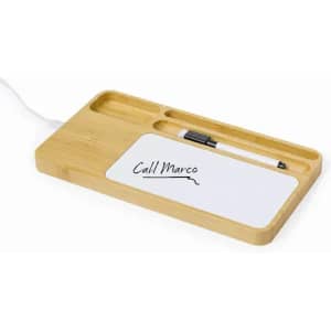 A bamboo desk organiser featuring sections for a pen and a notepad with handwritten text.