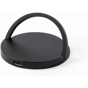 A black circular charging dock with a handle and a USB-C port on the side.