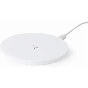 A wireless charger in a circular shape, featuring a minimalist white design and a connected power cable.