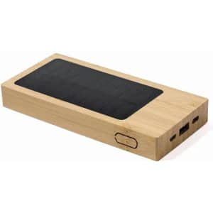 A power bank with a bamboo exterior, featuring a black solar panel on top and USB ports on the side.
