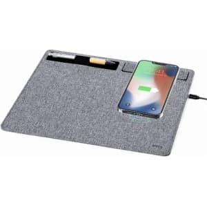 A desk mat in grey with a built-in wireless charging pad, holding a phone and a pen. Features a minimalistic design.