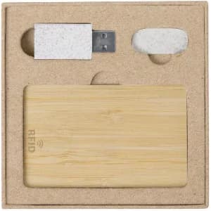 A box containing a bamboo RFID card, a USB stick, and a small white circle, all on a kraft paper insert.