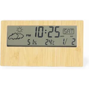 A digital clock with a wooden frame, displaying the time, date, temperature, humidity, and weather icons.