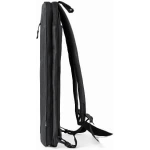 A black slim backpack with adjustable straps and a sleek design, featuring a discreet logo.