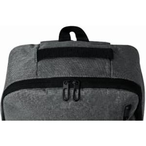 A backpack in a grey fabric with a black zipper and strap details on the top. It has a small handle for carrying.