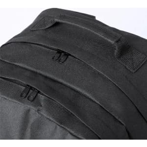A black backpack featuring multiple zipped compartments and sturdy handles. It has a sleek, modern design.