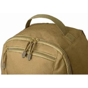 A tan backpack with multiple zippered compartments and a sturdy top handle. It has a textured fabric.