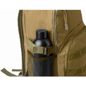 A drink bottle in black is securely placed in the side pocket of a tan backpack. The pocket features mesh and straps.