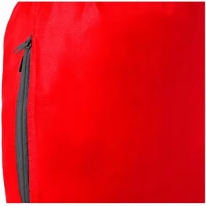 A red promotional bag features a black zip on its side and a smooth fabric texture.
