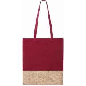 A tote bag featuring a maroon upper section and a natural jute lower section, with two fabric handles.