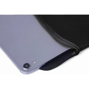 A tablet partially inside a black protective sleeve, showcasing the device's camera and sleek edge.