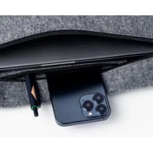 A grey felt pouch containing a smartphone and a pen, with a zipped opening and a sleek design.