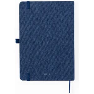 A navy blue notebook with a textured cover, featuring an elastic band closure and a ribbon bookmark.