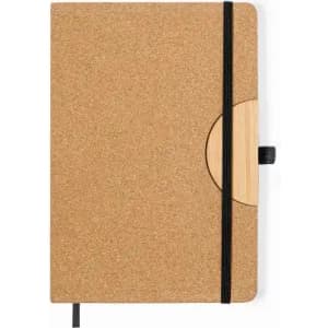A cork-covered notebook featuring a black elastic closure and a wooden accent on the cover.