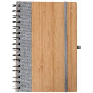 A notebook with a bamboo cover, grey fabric binding, and spiral binding. It has an elastic band for closure.