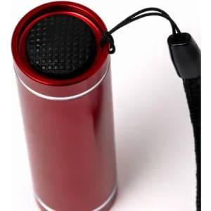 A drink bottle in vibrant red with a textured black cap and a black strap attached.