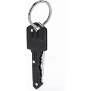 A black key with a keyring attachment, featuring a serrated edge and a textured surface.