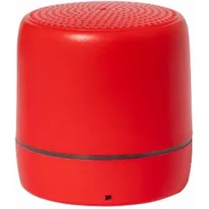 A red portable speaker with a textured top and a sleek design, featuring a branding logo on its body.