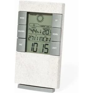A digital weather station in a grey casing displaying temperature, humidity, and time. It features a logo.