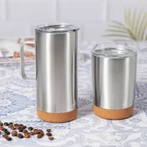 A drinkware set featuring two stainless steel coffee mugs with cork bases and clear lids. One mug is larger than the other.