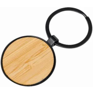 A keyring featuring a round wooden disc with a natural wood grain design and a black metal attachment ring.