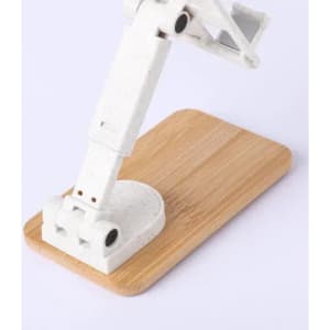 A desk lamp with a white arm and a wooden base, featuring a sleek and modern design.