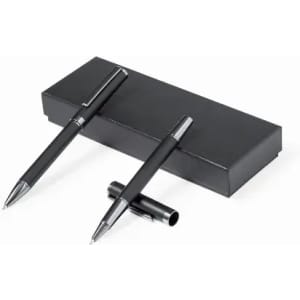A set of black pens displayed on a black box, one pen is capped and the other is uncapped.