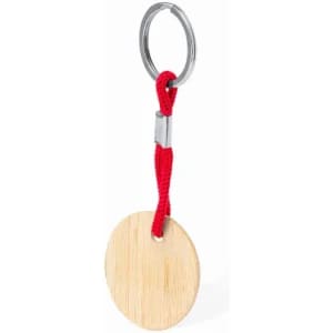 A keyring featuring a round wooden tag attached by a red cord, with a metal keychain loop.