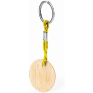 A keychain featuring a round wooden tag attached to a yellow cord and metal ring.
