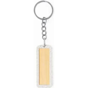 A keychain with a rectangular silver ring and a concrete and wood pendant. The wood section is smooth and light-toned.