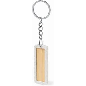 A keyring featuring a rectangular design with a bamboo centre and a silver chain. The frame has a speckled finish.