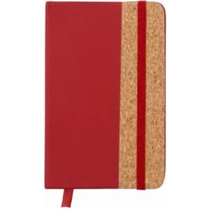 A red notebook with a cork panel on the side and a matching red elastic band. It features a bookmark ribbon.