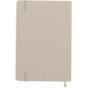 A light beige notebook with green elastic bands and a ribbon bookmark. It features a simple design with no visible text.