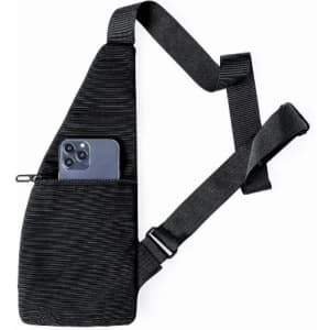 A black sling bag with a side pocket for a phone, featuring a textured design and an adjustable strap.