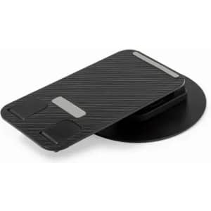 A sleek black phone stand with a textured surface and a circular base, featuring an understated logo.
