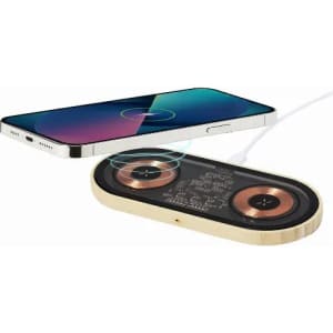 A wireless charger with a wooden base and two circular charging pads, alongside a smartphone in vibrant colours.