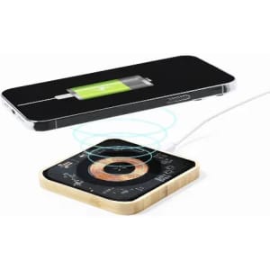 A wireless charger with a wooden base and a phone charging above it, displaying a battery icon.