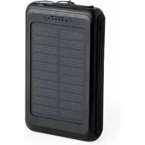 A solar power bank in black with a textured surface and multiple charging ports. It features a logo on the front.