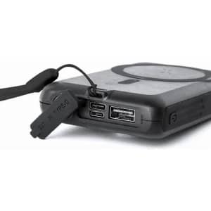 A portable power bank in black, featuring USB ports and a Type-C input, with a secure cap.