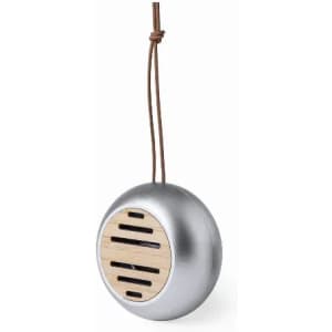 A round silver speaker with a wooden panel, suspended by a brown cord. The speaker features vent-like openings.