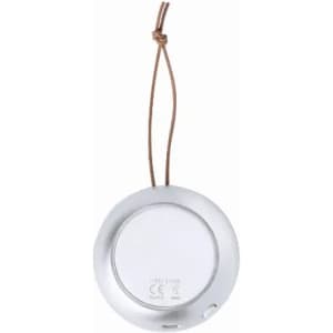 A round silver product with a brown hanging cord, featuring a smooth and plain surface. It has a logo on the back.