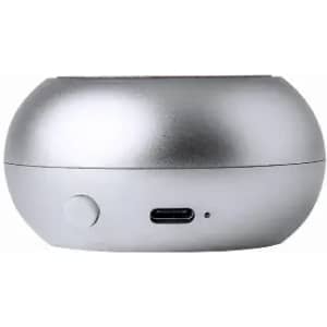 A silver, rounded gadget featuring a charging port and a button on the side. It has a sleek, modern design.