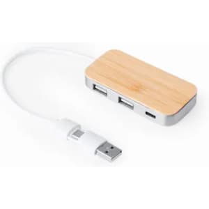A USB hub with a bamboo top and silver base, featuring multiple ports and a white connecting cable.