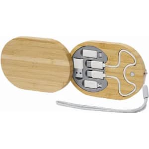 A bamboo charging station with a lid, featuring assorted charging cables neatly organised inside.