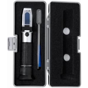 A refractometer with a black grip, silver body, and a blue pipette, housed in a protective case.